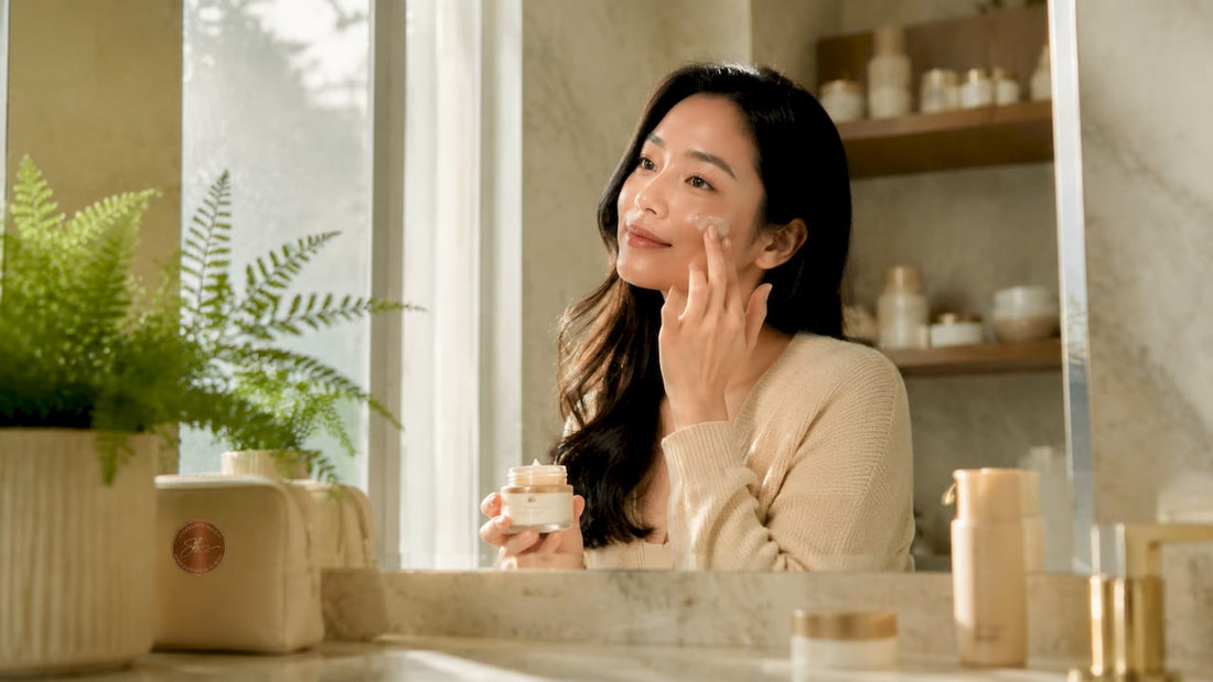 Woman applying microbiome skincare cream