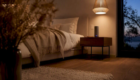 Calm bedroom with speaker playing sleep music